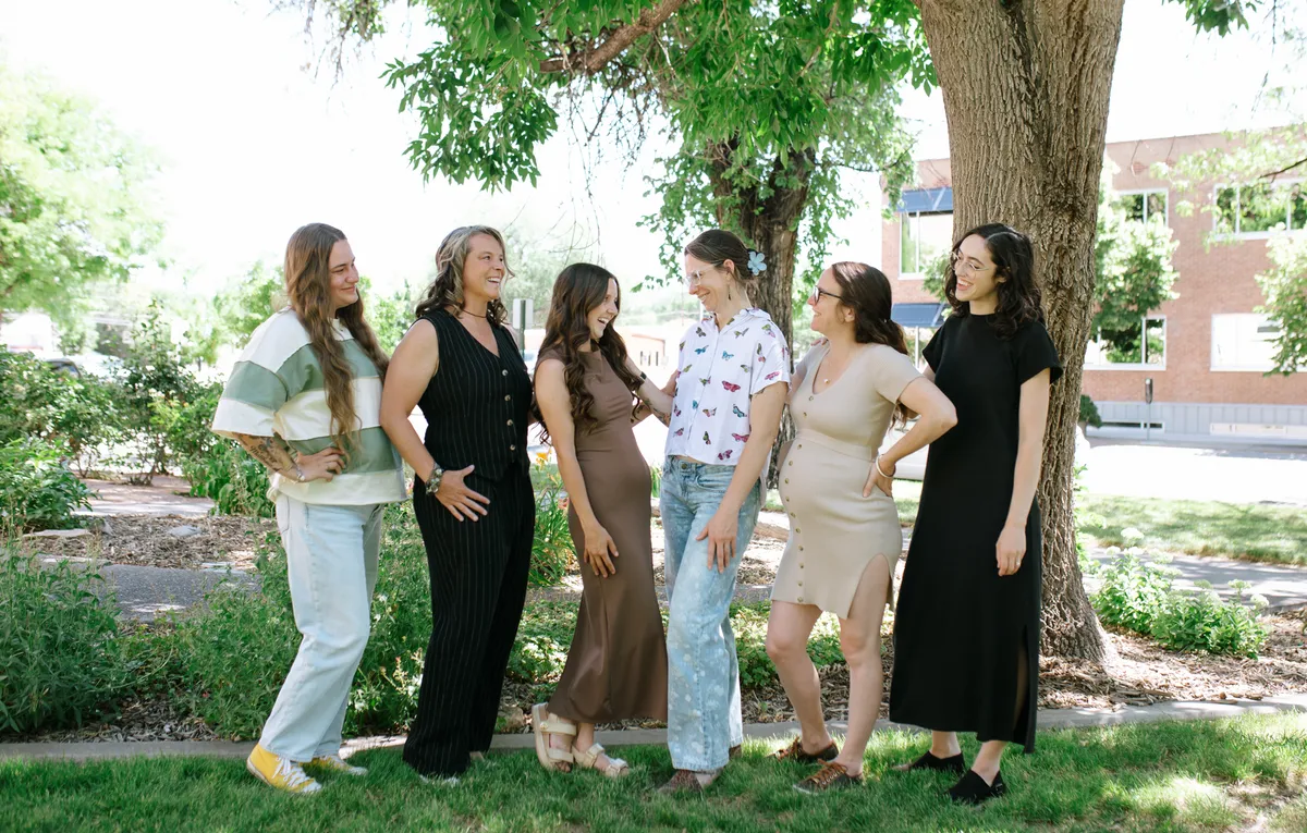 Collective members gathered together outdoors